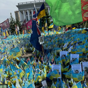 Nine Australian flags fly amid a sea of Ukranian flags in Independence Square, Kyiv. Each flag is in honour of an Australian known to have died fighting for Ukraine in the International Legion.