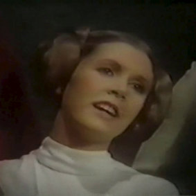 She stars, she slays, she ... sings? Carrie Fisher as Princess Leia in The Star Wars Holiday Special (1978).