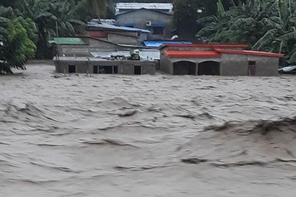 Roads and bridges have been destroyed in flash flooding.