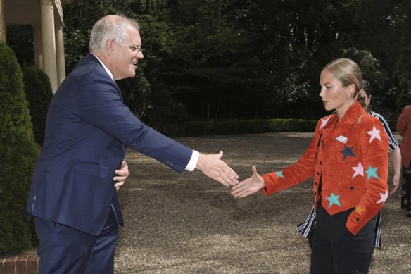Grace Tame and Scott Morrison.