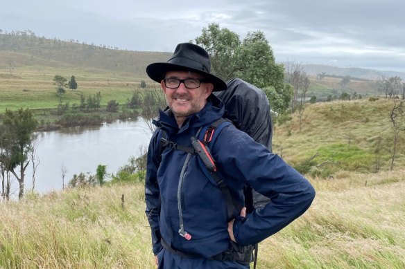 Author Simon Cleary on the Upper Brisbane River, 2022. It took him just under a month to walk its length.