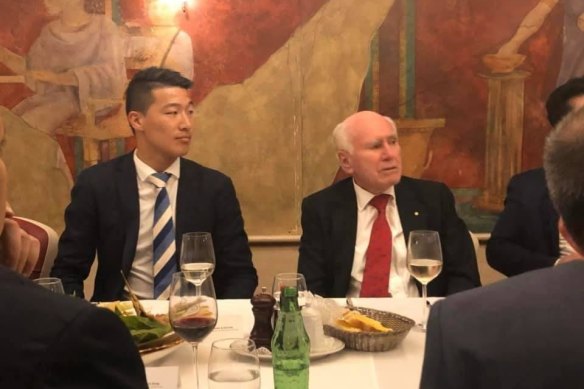Scott Yung, then the Liberal candidate for the state seat of Kogarah, sitting next to John Howard during a fundraiser at the Blue Angel restaurant. 