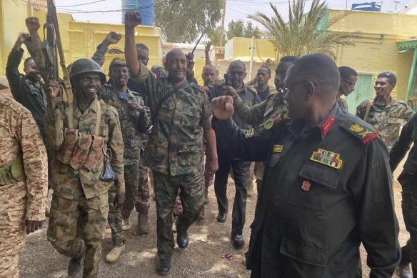 General Abdel-Fattah Burhan, de facto ruler of Sudan, visits Sudanese army troops in Khartoum.