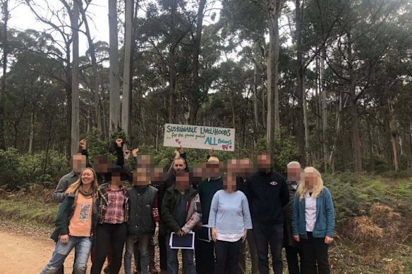 Rebecca Swift (far left, orange T-shirt) and Nugent (middle second row) in November 2019.