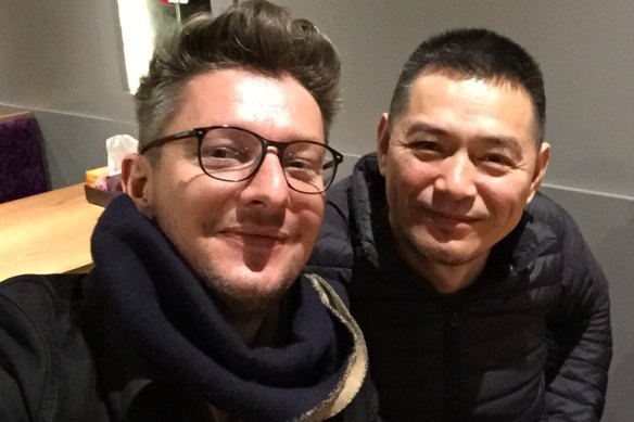 With dissident artist friend Guo Jian.
