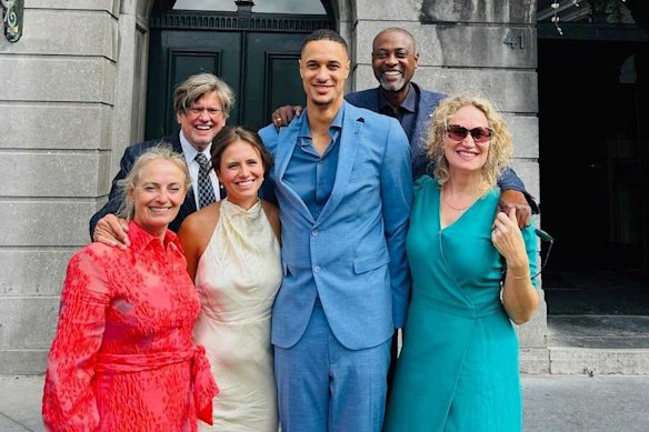 Melbourne United centre Jesse Edwards and his wife Quirine Edwards-Comans, middle, with their families after their wedding this year.