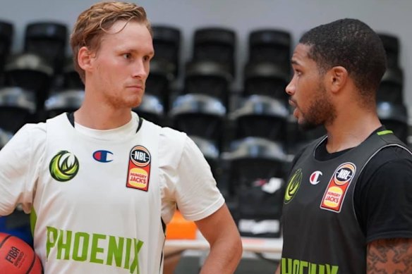 Keifer Sykes, right, with teammate Kyle Adnam. 