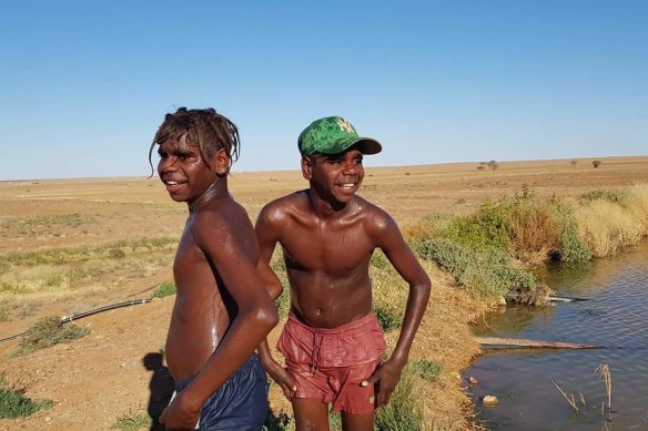 Tyler and Tashiem Abbott, en route from the outback to “a better life.”