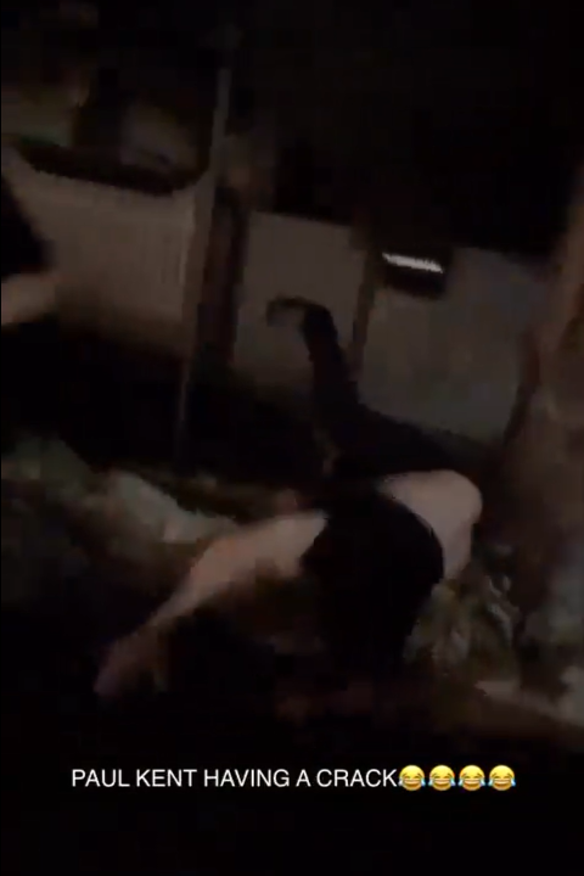 Kent takes a tumble during the scuffle.