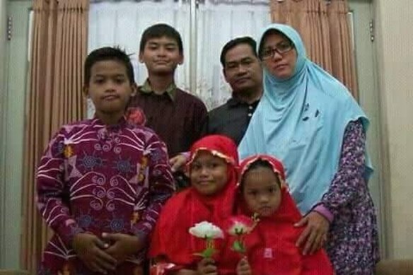 Dita Oeprianto and his wife Puji Kuswati with their four children. All six family members were involved and died in the suicide attacks. 