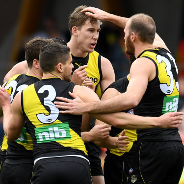 The Tigers celebrate a Tom Lynch goal against his former club.