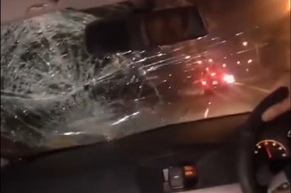 A screengrab from a video posted to social media showing a car hitting a cyclist.