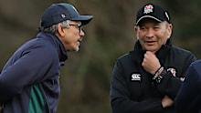 England coach Eddie Jones talks to London Irish coach Les Kiss in 2019.