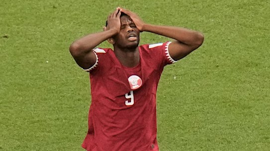 Qatar’s Mohammed Muntari reacts during the World Cup group A soccer match against Ecuador.