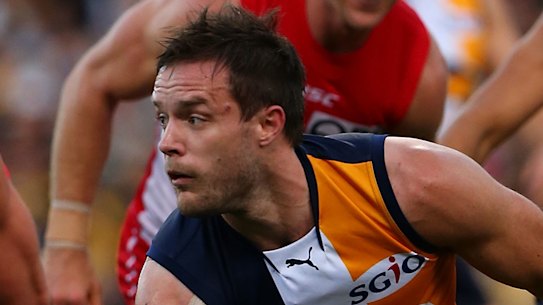 Former West Coast player Mitch Brown, centre, is the first current of former AFL players to come out as bisexual.