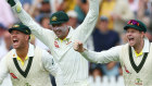Australia celebrate another wicket.