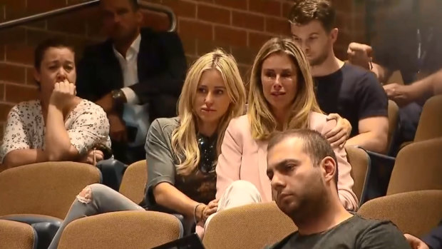 Strain takes toll: Candice Warner breaks down with PR manager Roxy Jacenko seen consoling her during her husband's press conference.