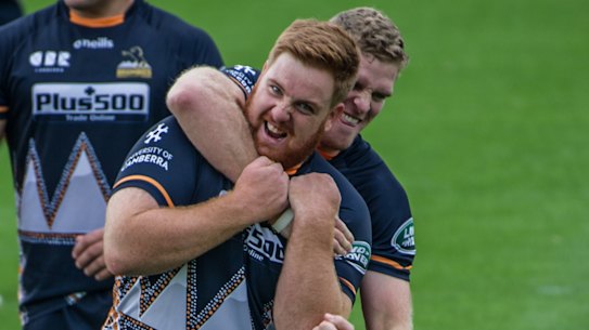 Tom Ross, front, and Tom Cusack are two of seven Canberra players in the Brumbies' side this week. Ross will make his Super Rugby debut as a 20-year-old on Friday night.