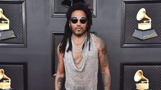Lenny Kravitz defied expectations of dressing your age when he arrived at the 64th Annual Grammy Awards in Las Vegas.
