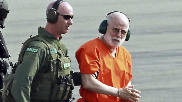 Bulger is escorted from a helicopter in 2011 after a court hearing.