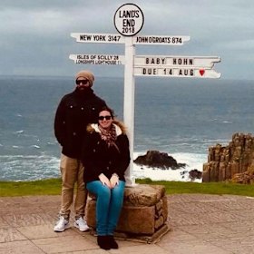 Charley Anning and her partner announcing their pregnancy in Lands End in England.