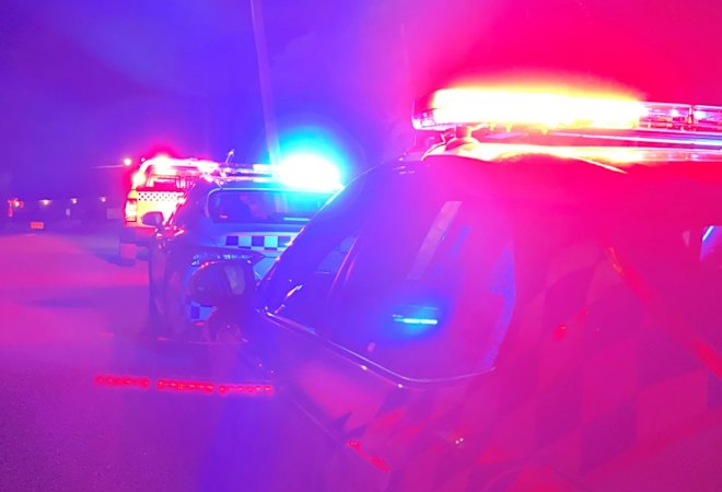 Police officer shot, rushed to hospital as suburb locked down
