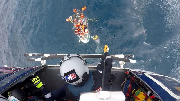 The RACQ Capricorn Rescue helicopter winched one person to safety from the sinking dinghy.