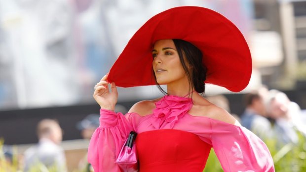 Pretty in red-pink: Olympia Bellchambers at Caulfield Cup on October 15, 2022.