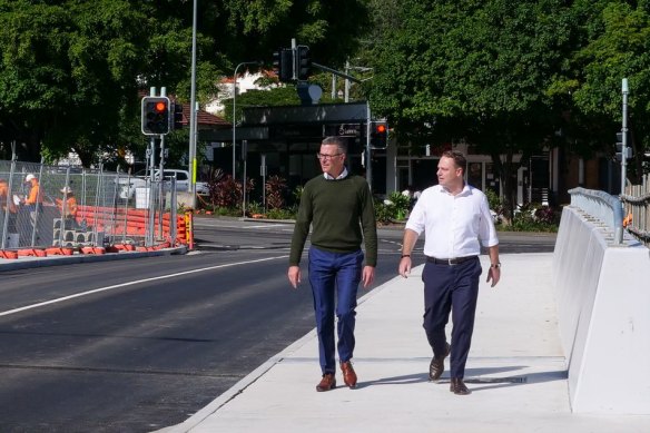 Lord mayor Adrian Schrinner (right) and local councillor Steve Toomey cross the new Gresham Street bridge on Tuesday.