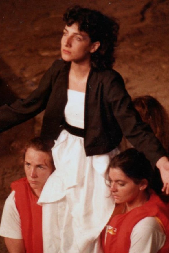 Actors disembark a boat on the Yarra River and arrive on stage at Fairfield Park in 1984 for <i>Iphigenia in Aulis.