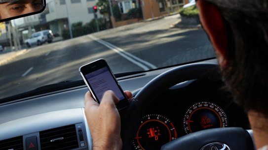 NSW's world-first, high-tech crackdown on mobile phones in cars