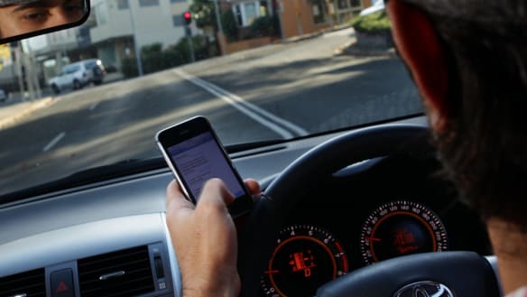 NSW's world-first, high-tech crackdown on mobile phones in cars