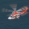 An ambulance helicopter near where the three people were washed into the water on Friday.