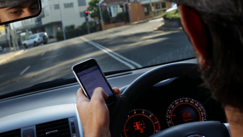 Technology can crack down on mobile phone use while driving - Sydney Morning Herald