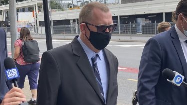 Suspended Queensland police senior constable Robert Eickenloff leaves Brisbane Arrests Court on Monday.