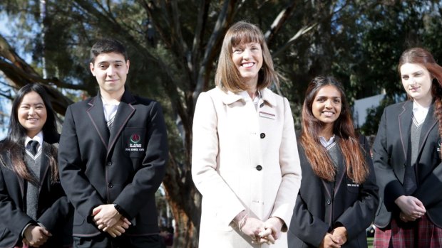 St Albans Secondary College principal Kerrie Dowsley with students Francisco Passadore-Rocha, Christie Vo, Brigitte Thomas and Nikolina Arnaut at the school in 2014.