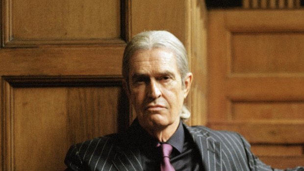 Rupert Everett as an ageing and seedy porn impresario in Adult Material.