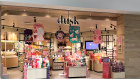 Retailer Dusk is being targeted by an obscure Thai shareholder who is calling for a buyback.