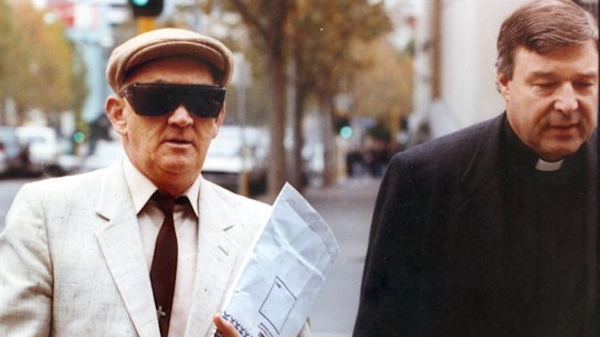Gerald Ridsdale outside court in 1993, accompanied by George Pell.