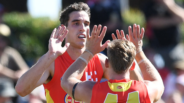 Ben King (left) has just completed his debut season on the Gold Coast.