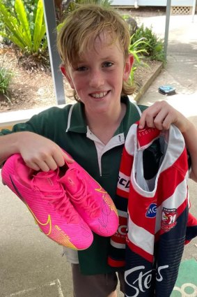 Cody Cochrane with James Tedesco’s boots and jumper.