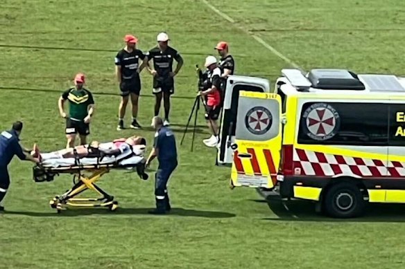 Dragons prop Loko Pasifiki Tonga is taken from WIN Stadium in an ambulance.