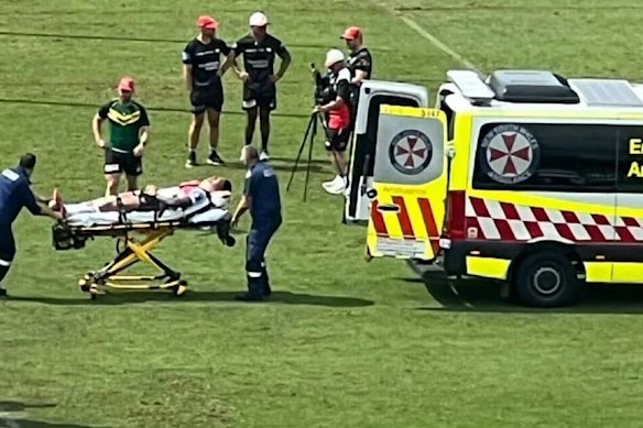 Dragons prop Loko Pasifiki Tonga is taken from WIN Stadium in an ambulance.