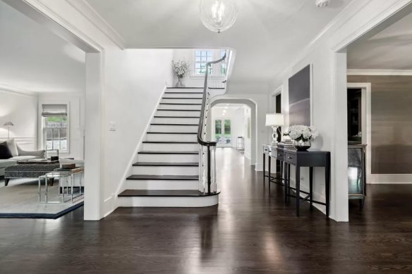 While the property underwent a major renovation in 2018, the staircase in the foyer has been maintained. 
