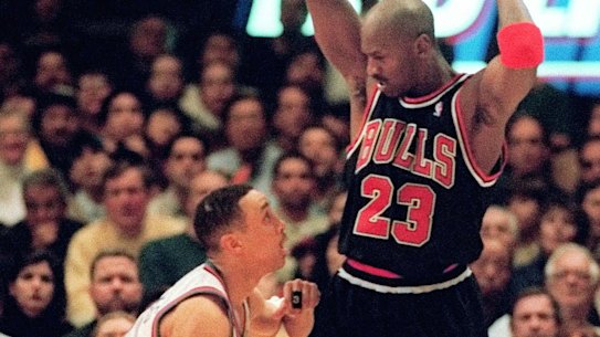 Chicago legend Michael Jordan with New York's John Starks at Madison Square Garden in 1998.