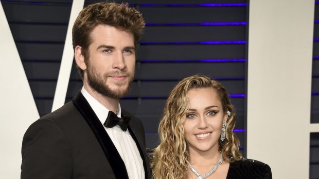 Liam Hemsworth and Miley Cyrus at the Vanity Fair Oscar Party.