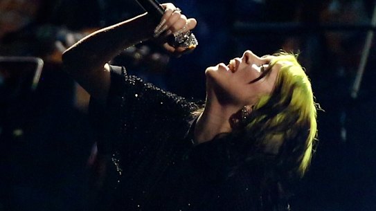 Billie Eilish performs on stage at the Brit Awards 2020 in London.