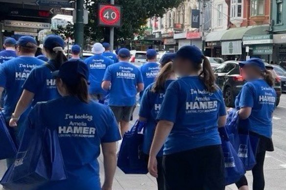 Brethren members supporting the Liberal candidate head to a polling booth in Kooyong.