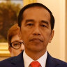 Governor-General David Hurley greets the Indonesian President Joko Widodo.