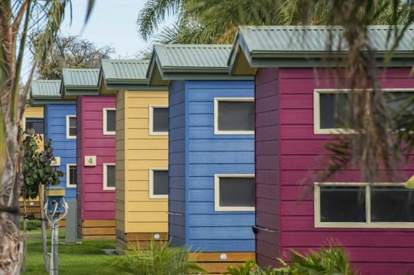 Discovery Parks - Colorful standard cabins at West Beach Parks.